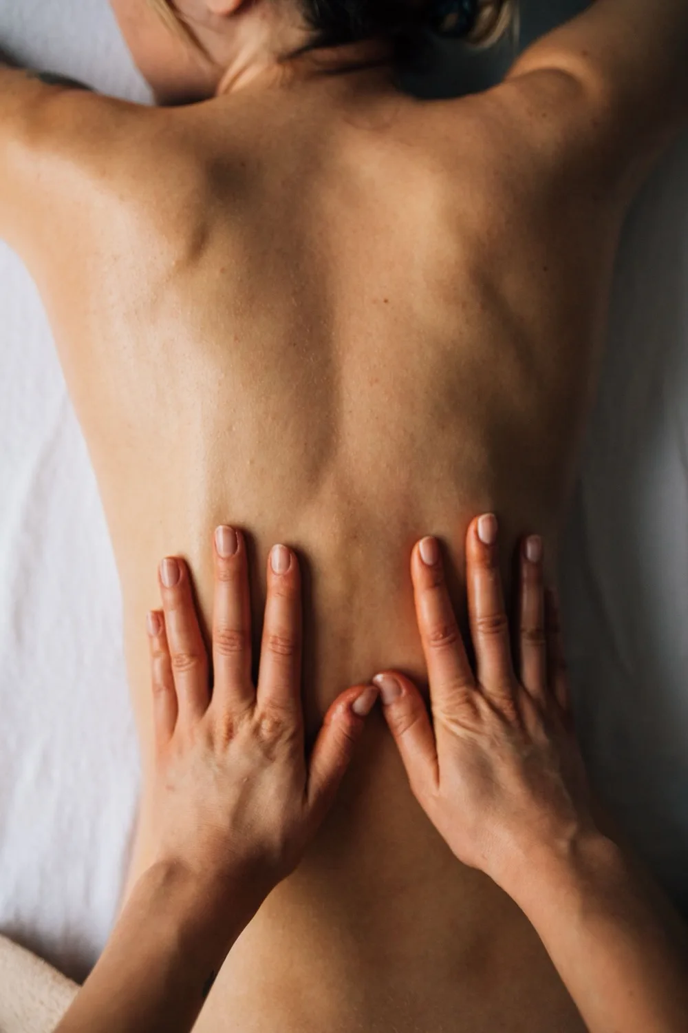 Therapeutic massage session at Great Falls Movement Center.